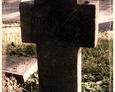 Damnica - cmentarz komunalny (kamienny krzyż z mało widocznym napisem)